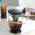 Caféor coffee maker with a glass carafe on a table.